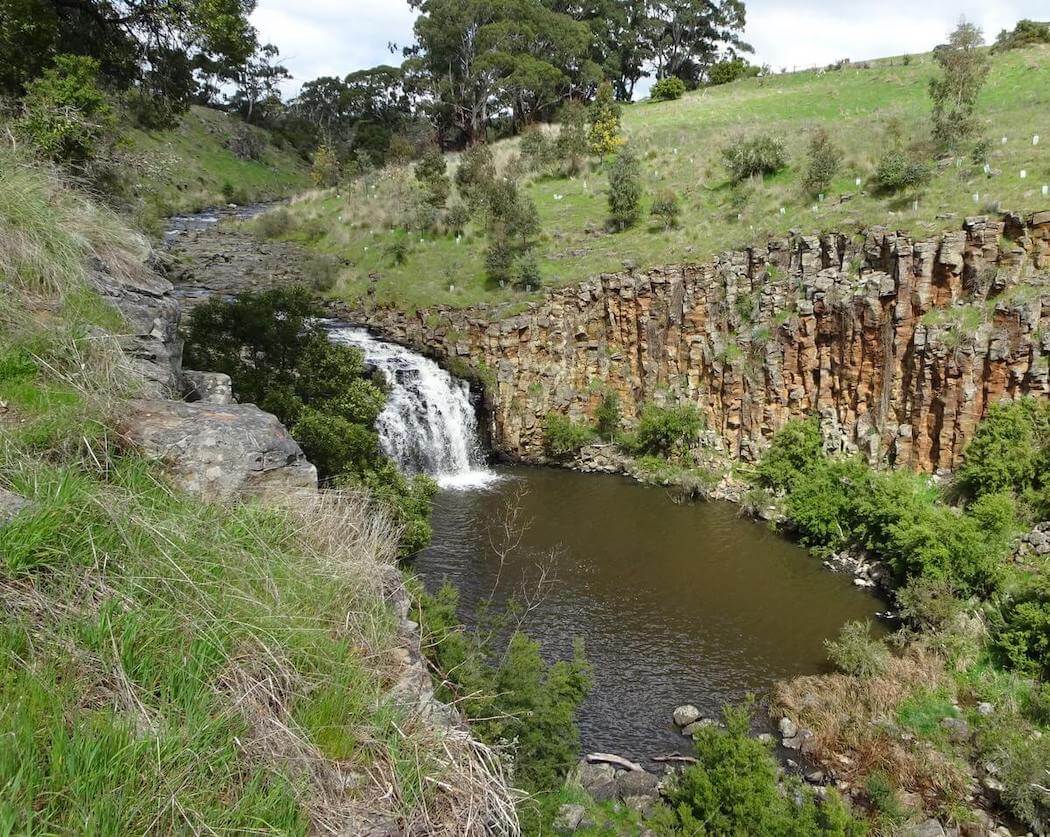 Waterfall and water pool at Loddon Falls, one of the best waterfalls in Daylesford.