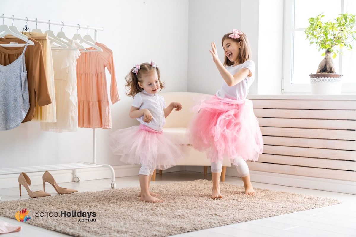 Fun holiday activities for kids at home: host a fashion show.
