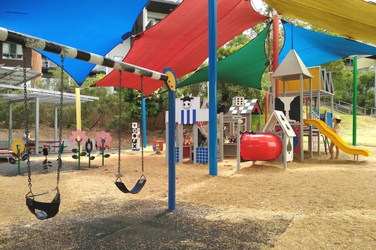 Grey Gums Park Playground is a fun place for imaginative play in Brisbane. It features sensory toys, grocery store, toy coffee machine & more.
