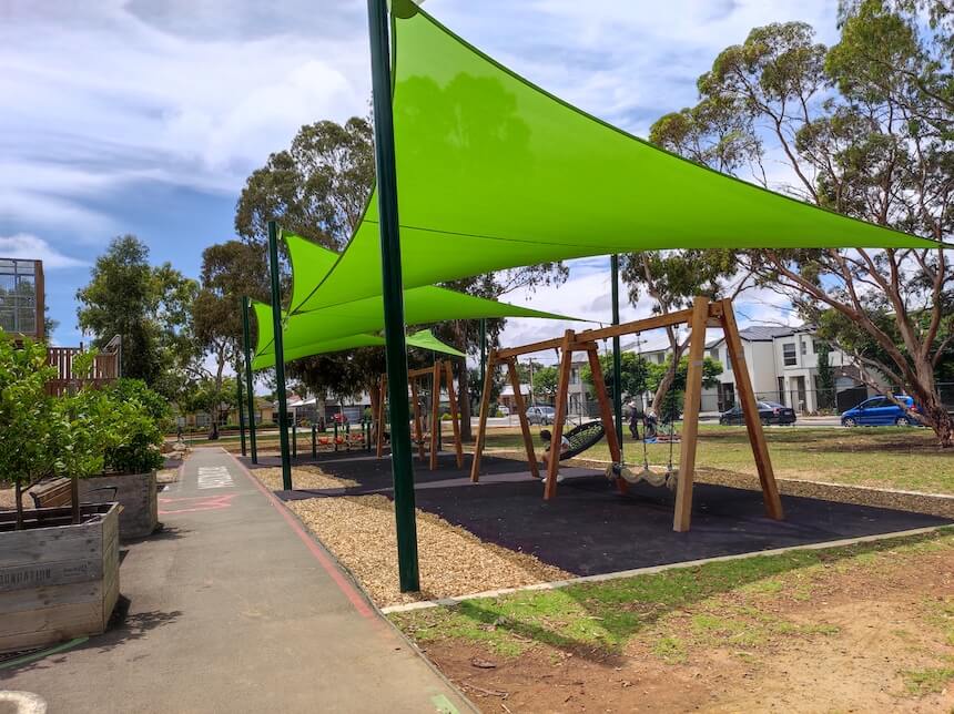Flat paths & shaded play area @ Hendrie Street Playground in Adelaide.